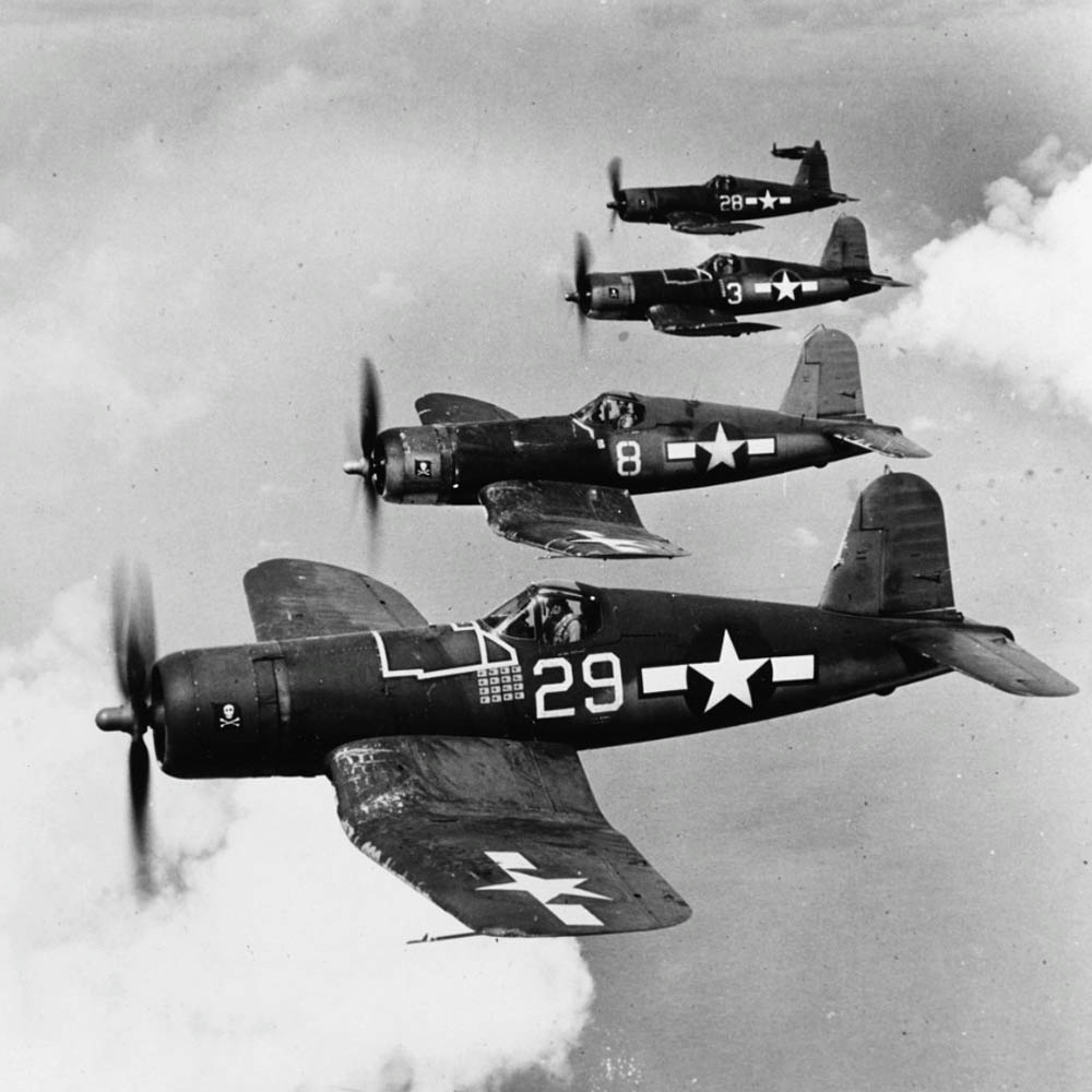 Formation of Vought F4U-1A Corsair fighters of VF-17 photographed in flight over Bougainville, March 1944. (U.S. National Archives Photograph.)