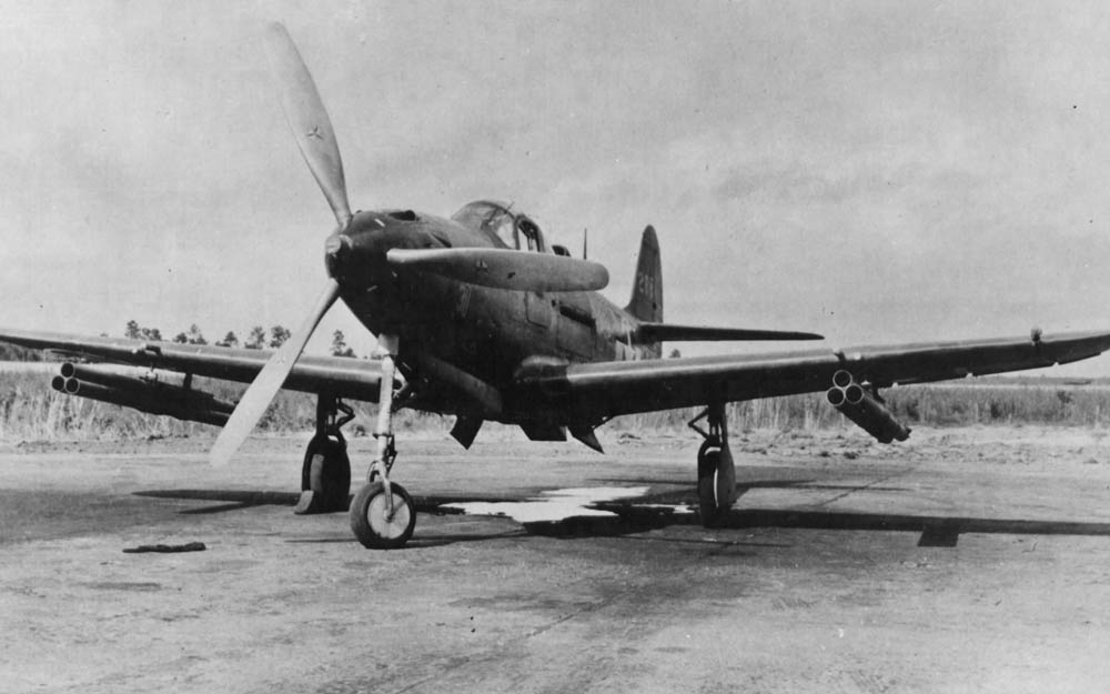 A rare view of a Bell P-39 Airacobra with a trio of rocket launchers mounted under each wing. (U.S. Air Force Photograph.)