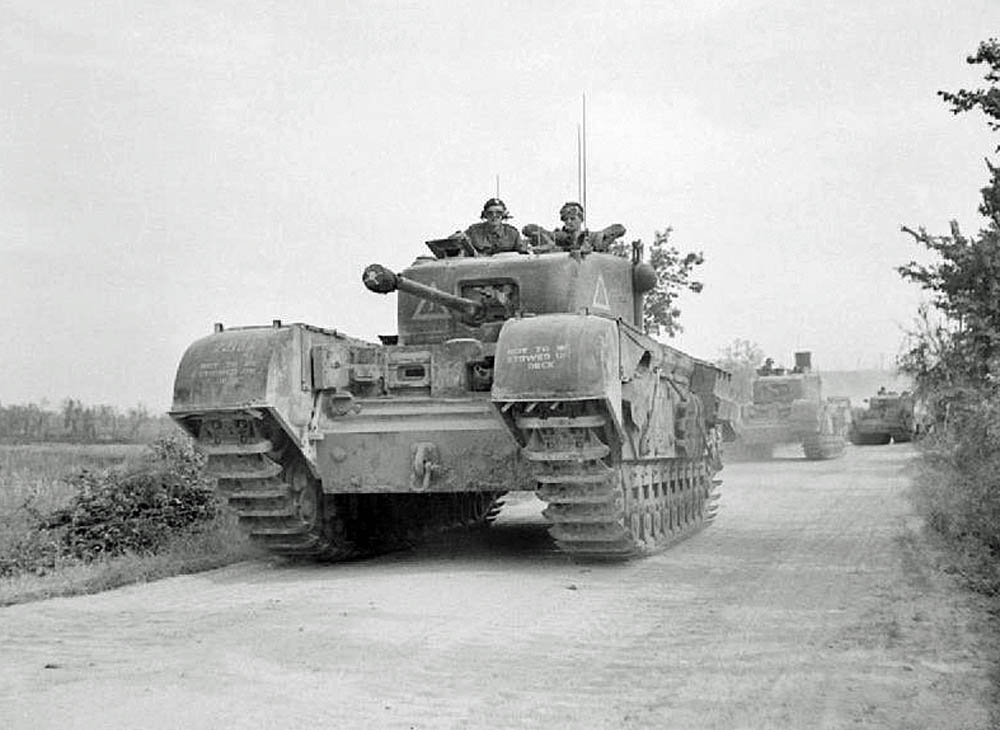 A column on Churchill tanks from the 25th Tank Brigade advance to support the 1st Canadian Division in Italy, May 1944. (Imperial War Museum Photograph.)