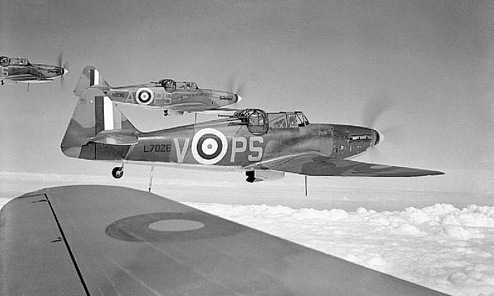 A Royal Air Force photographer captures a flight of three Boulton Paul Defiant Mk Is of the No. 264 Squadron, August 1940.
