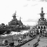 The battleships USS Missouri (BB-63), left, transfers supplies and personnel to the USS Iowa (BB-61), right, off the Japanese coast in August 1945. (U.S. Navy Photograph.)