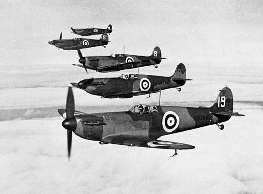 A group of Supermarine Spitfire Mark I fighters of No. 19 Squadron of the Royal Air Force is photographed in formation in 1938. (Imperial War Museums Photograph.)
