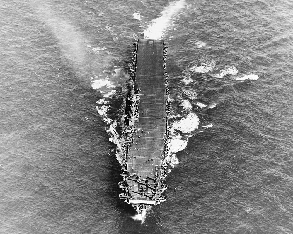Aerial view of the U.S. Navy aircraft carrier USS Enterprise (CV-6) underway in the Pacific, March 1944.