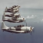 A formation of Douglas SBD-5 Dauntless dive bombers fly over the Caribbean in 1944 or 1945. (Official U.S. Navy Photograph, U.S. National Archives.)