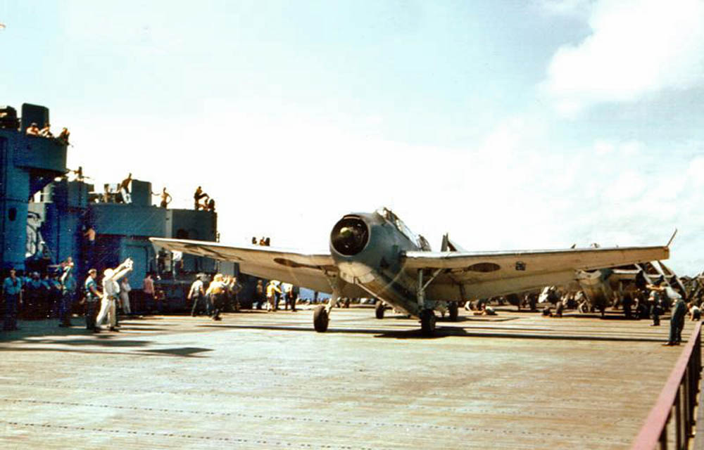 Color photograph of a U.S. Navy Grumman TBF-1 Avenger torpedo bomber waiting to takeoff from the flight deck of the Essex-class aircraft carrier USS Yorktown (CV-10) in 1943. (Official U.S. Navy Photograph.)