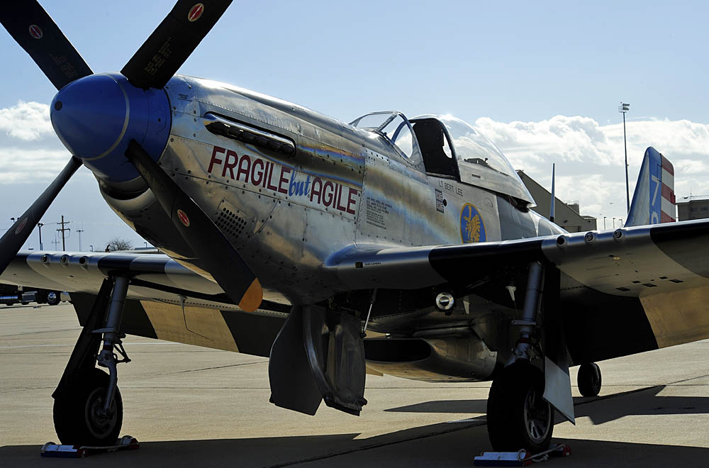 The P-51 Mustang Fragile but Agile parked on the flightline during 2015 Heritage Flight training at Davis-Monthan Air Force Base, Arizona in 2015. (U.S. Air Force photograph by S/Sgt. Courtney Richardson.)