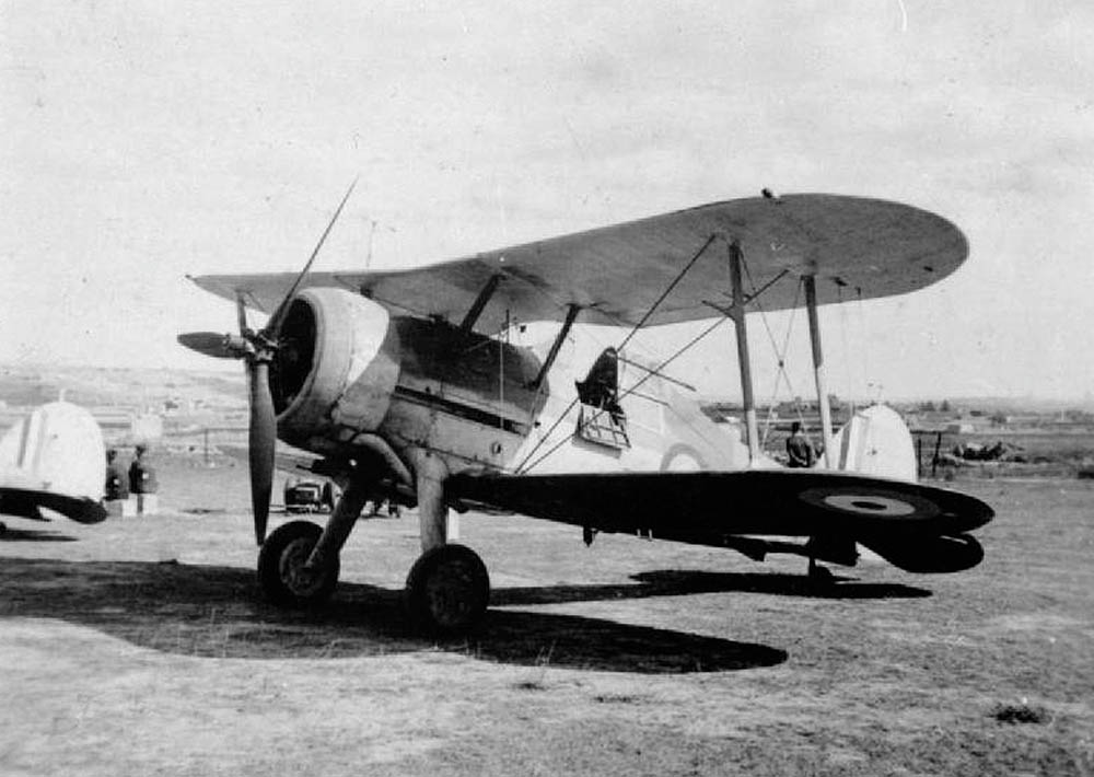 A Gloster Sea Gladiator Mark I of the Royal Air Force photographed on the ground at an airfield in Malta, probably in September 1940. (Imperial War Museum Photograph.)