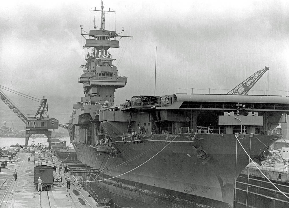 The U.S. Navy aircraft carrier USS Yorktown (CV-5) under repair in the drydock at Pearl Harbor Navy Yard in May 1942. (Official U.S. Navy Photograph.)