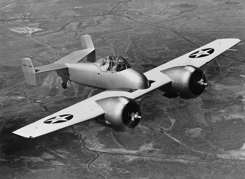 The sole prototype of the Grumman XF5F Skyrocket fighter/interceptor flies past the cameraman to show its unique design. (U.S. National Archives and Records Administration Photograph.)
