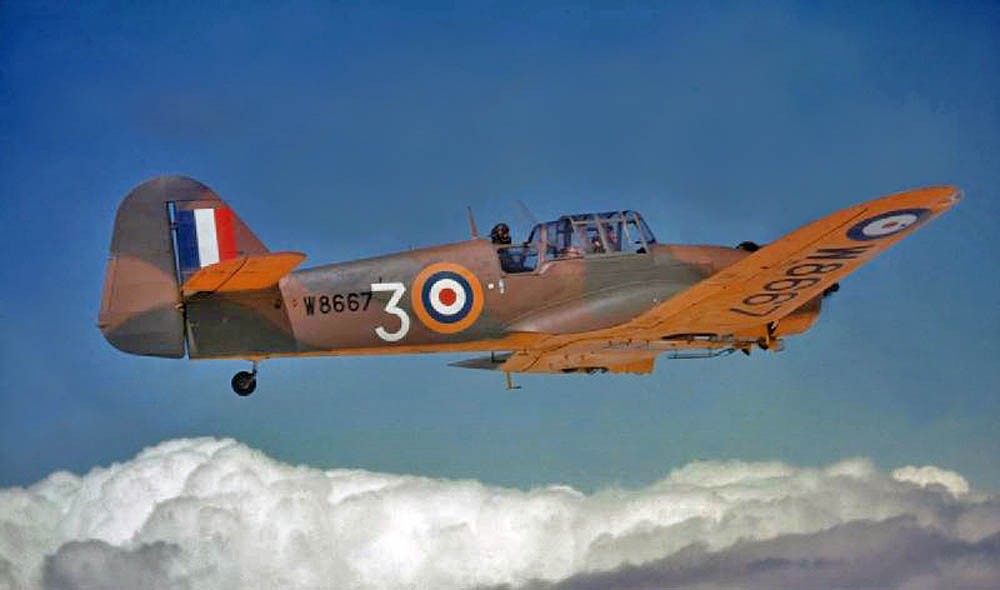 A Miles M.27 Master III advanced trainer built by Miles Aircraft Ltd. photographed over the United Kingdom. (Imperial War Museum Photograph.)