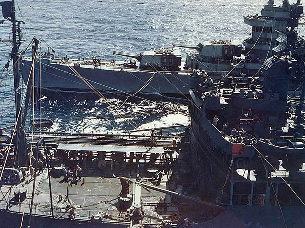 The New Orleans-class cruiser USS Minneapolis (CA-36) refuels from a U.S. Navy oiler at sea during the Marshall Islands campaign in January 1944. (U.S. Navy Photograph.)