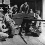 The crew of a 37-mm anti-tank gun train at Fort Benning, Georgia. (U.S. National Archives and Records Administration Photograph.)