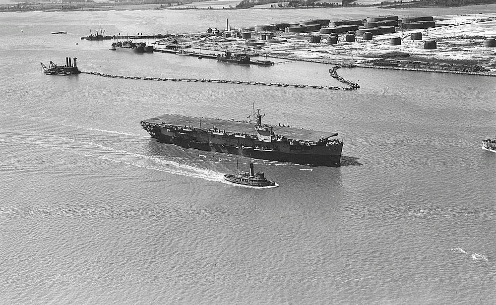 Aerial photograph of the escort carrier USS Card (ACV-11) in Hampton Roads, Virginia. (U.S. Navy Photograph.)