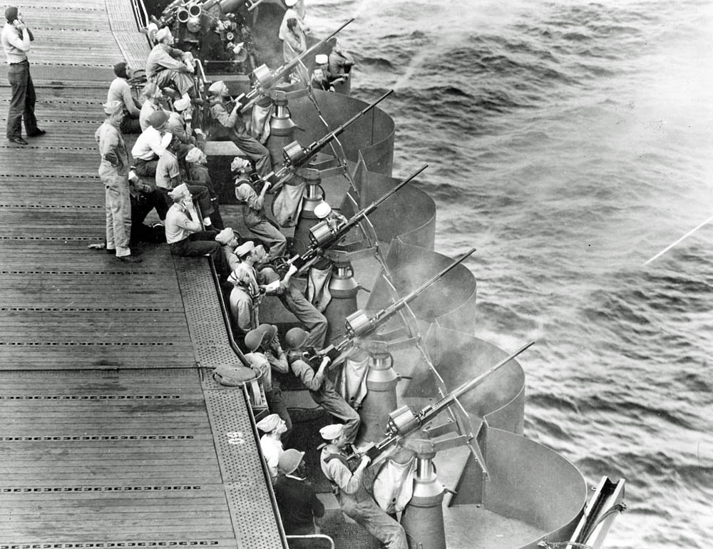 Gunnery training with Oerlikon guns underway on the U.S. Navy aircraft carrier USS Enterprise (CV-6) in May 1942. (U.S. Navy Photograph.)