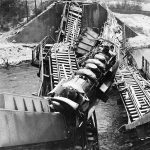 A German train destroyed while crossing a Moselle River bridge by U.S. fighter-bombers from the 9th Air Force. (U.S. Air Force Photograph.)