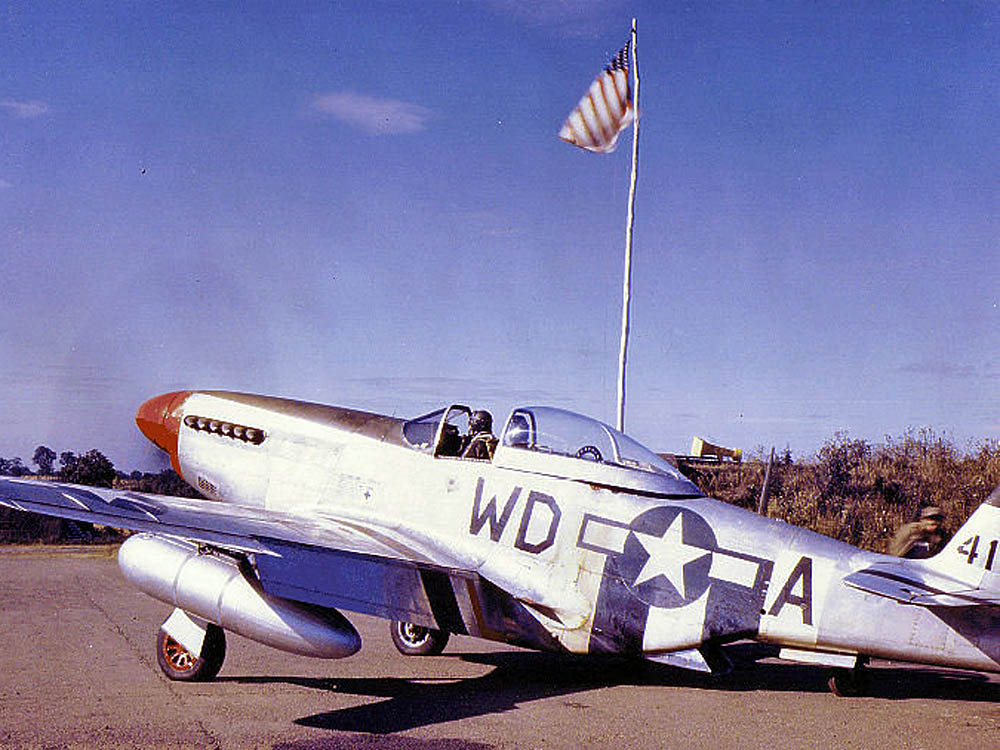 Color photograph of a P-51D Mustang of the 336th Fighter Squadron, 4th Fighter Group in 1944. (United States Air Force via National Archives.)