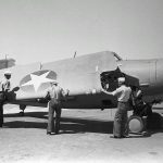 A U.S. Navy Grumman F4F-4 Wildcat fighter of Fighting Squadron Three (VF-3) photographed at Naval Air Station Kaneohe, Oahu in May 1942 with ground crew. (Official U.S. Navy Photograph.)