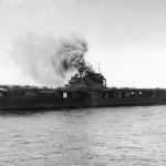 The U.S. Navy aircraft carrier USS Yorktown (CV-5) burns on June 4, 1942 after attacks from Japanese dive bombers during the Battle of Midway. (Official U.S. Navy Photograph.)