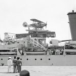 A Hawker Osprey -- the naval version of the Hawker Hart -- aboard the British light cruiser HMS Enterprise in Haifa. (United States Library of Congress Photograph.)