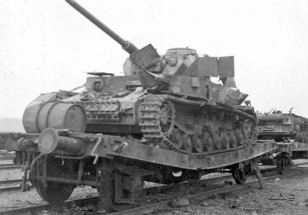 A Panzer IV on a railcar destroyed by Allied air attack near Dasburg, Germany. (U.S. Air Force Photograph.)