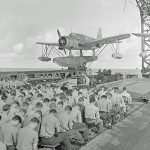 Sunday religious services on board the USS Mobile (CL-63) in August 1943. (National Archives and Records Administration.)
