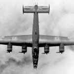 A well framed top view of a Consolidated B-24 Liberator flying somewhere over the clouds. (U.S. Air Force Photograph.)