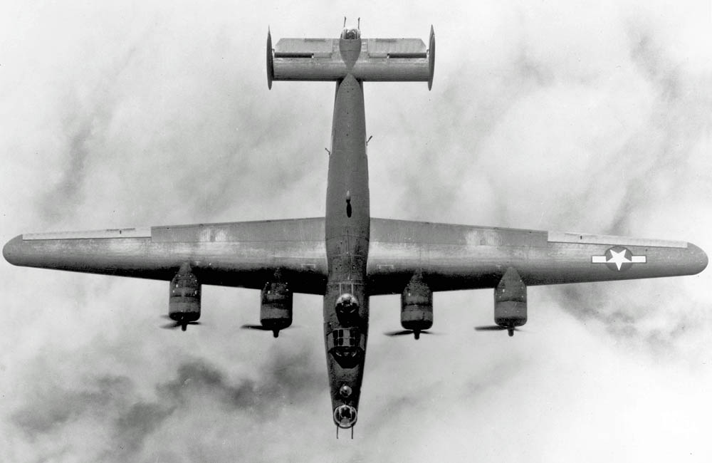 A well framed top view of a Consolidated B-24 Liberator flying somewhere over the clouds. (U.S. Air Force Photograph.)