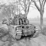 Churchill tanks of 6th Guards Tank Brigade carry U.S. Army paratroopers of the 17th Airborne Division forward in Germany in March 1945. (Imperial War Museum Photograph.)