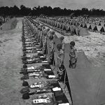 Soldiers of the 347th Infantry Regiment, 87th Infantry Division line-up for inspection during the Second Army Tennessee Maneuvers. (U.S. Army Signal Corps Photograph.)