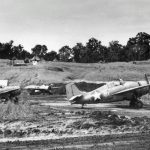 A collection of U.S. Navy Grumman F4F-4 Wildcat fighters from Escort-Fighter Squadron VGF-27 parked alongside Fighter Strip No. 1 on Guadalcanal in February 1943. (U.S. Navy Photograph.)