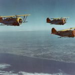 Three Grumman F3F-3 fighters from U.S. Navy Fighting Squadron 5 (VF-5) from the aircraft carrier USS Yorktown (CV-5) fly over southern California in 1939. (Official U.S. Navy Photograph.)