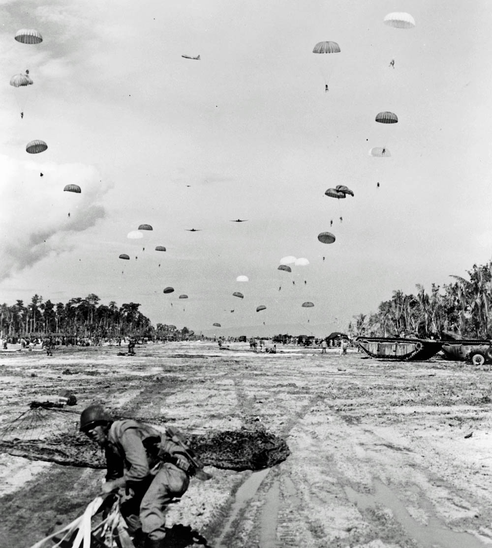 U.S. Army paratroopers land at Kamiri Strip, Noemfoor Island in 1945. (U.S. Library of Congress Prints and Photographs.)