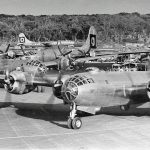 B-29 Superfortresses from the 29th Bombardment Group taxi at North Field, Tinian in 1945. (U.S. Air Force Photograph.)