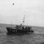 A rescue vessel from the Air Sea Rescue Service pulls alongside two rubber dinghies with crew members of a B-17 Flying Fortress forced down in the North Sea in August 1943. (U.S. Air Force Photograph.)