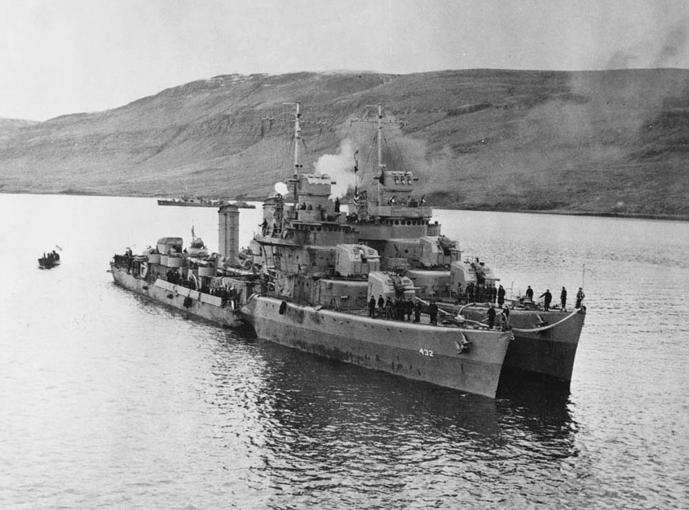 Destroyer USS Kearny (DD-432) alongside the USS Monssen (DD-436) in port at Reykjavik, Iceland after the USS Kearny had been torpedoed by the German submarine U-568. (Official U.S. Navy Photograph.)