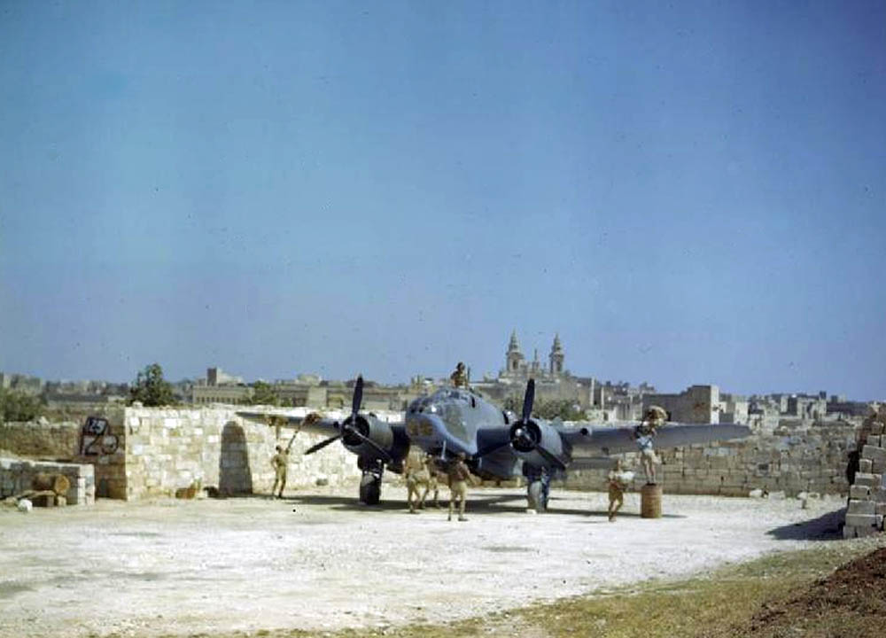 Ground crew performs maintenance on a Bristol Beaufort Mark II of No. 39 Squadron, Royal Air Force at Luqa airfield, Malta in June 1943. (Imperial War Museums Photograph.)