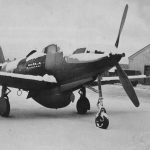 A Bell P-39 Airacobra fighter sits covered in snow at Ladd Field, Alaska in February 1944. (U.S. Air Force Photograph.)