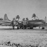 Mechanics perform maintenance work on a Boeing B-29 Superfortress, converted to an F-13 photographic reconnaissance variant, on Guam in the Mariana Islands. (U.S. Air Force Photograph.)