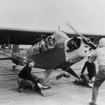 A Piper L-4 Grasshopper liaison aircraft, nicknamed Elizabeth, prepares to takeoff from the USS Ranger (CV-4) during Operation Torch in November 1942. (U.S. Navy Photograph.)