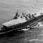 The Independence-class light aircraft carrier USS Cabot (CVL-28) departs Pearl Harbor with the aircraft of Carrier Air Group 32 (CVG-32) on board, en route to Eniwetok. (Official U.S. Navy Photograph.)