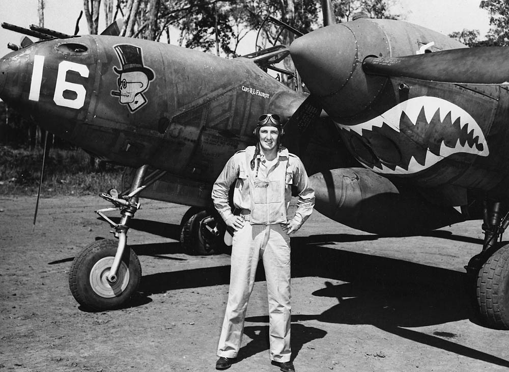 Fighter ace Capt. Robert L. Faurot poses in front of his P-38F Lightning aircraft assigned to the 39th Fighter Squadron, 35th Fighter Group. (U.S. Air Force Photograph.) 
