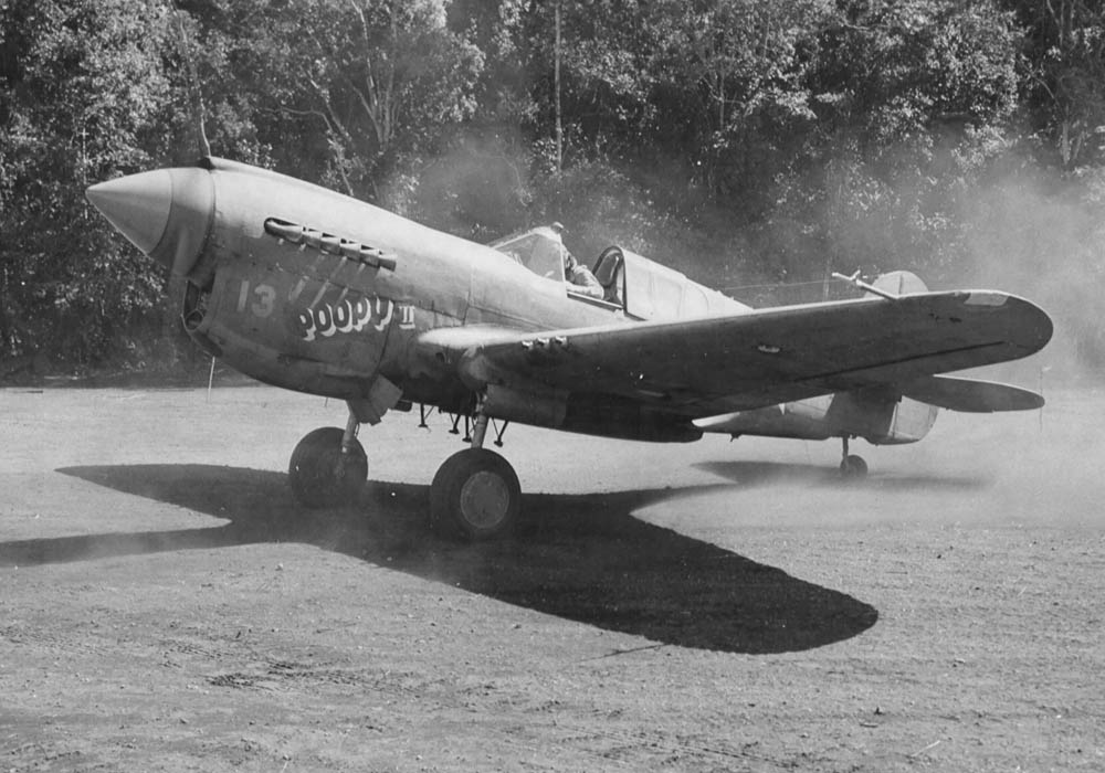 P-40E Warhawk from the 7th Fighter Squadron, 49th Fighter Group prepares for takeoff at Dobodura, New Guinea in May 1943. (U.S. Air Force Photograph.)