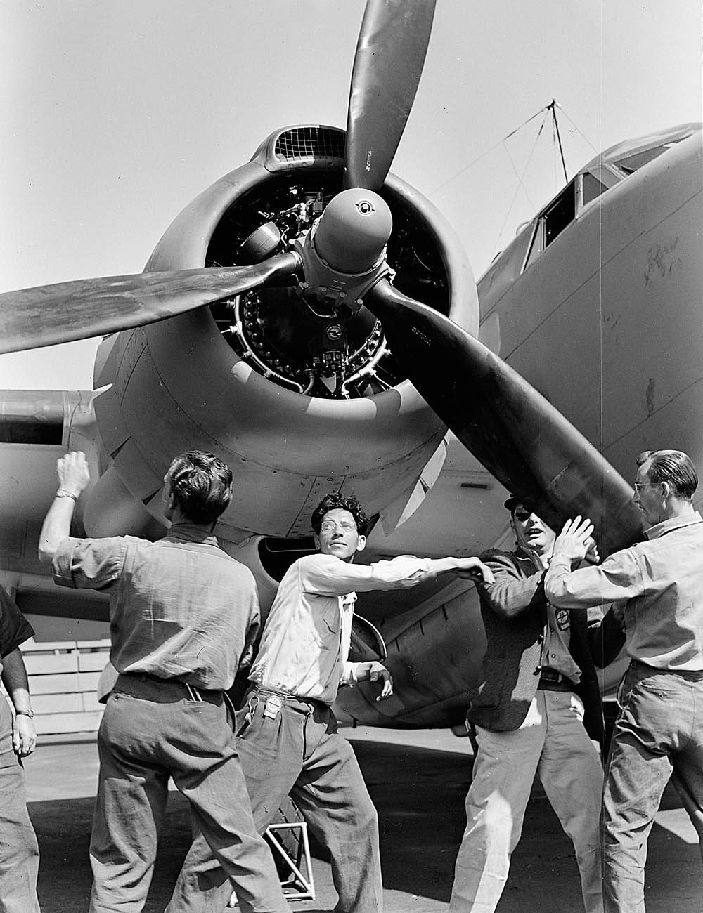 Factory workers perform final checks on a Lockheed PV-1 Ventura at the Vega Aircraft Company plant in Burbank, California. (U.S. National Archives and Records Administration Photograph.)