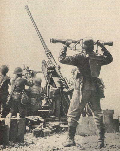 [Figure 7. 1-meter-base range-finder in use with 3.7-cm (37-mm) AA/AT gun.]