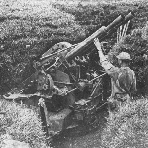 [Figure 233. Dual mounted 40-mm Vickers type AA/AT automatic cannon.]