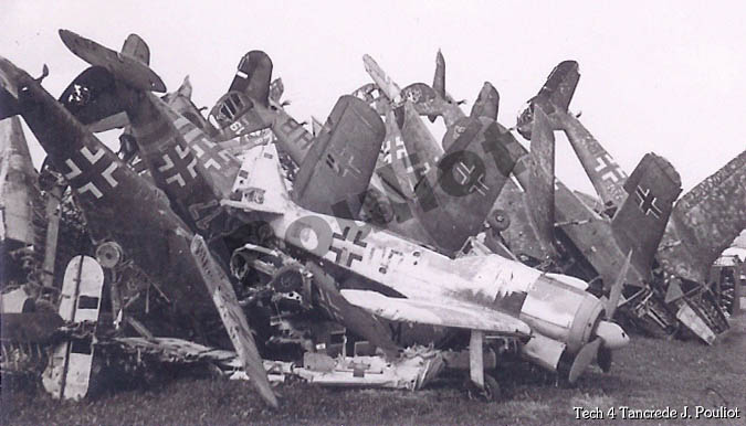 [Luftwaffe debris: wrecked German fighter aircraft]