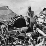 Souvenir hunting amid Japanese aircraft wreckage