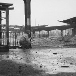 A U.S. infantryman takes cover in the railroad station of Hamm, Germany, April 1945. (U.S. Signal Corps Photograph.)