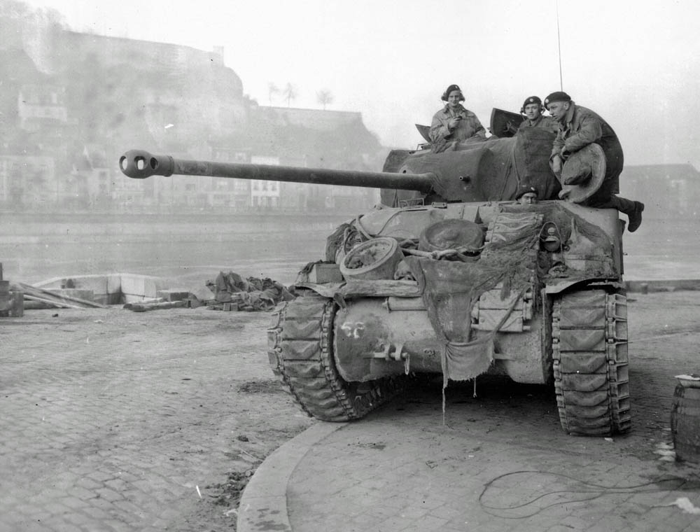 A British Sherman Firefly tank patrols in Namur, Belgium along the Meuse River during the Battle of the Bulge, December 1944. (U.S. Army Photograph.)