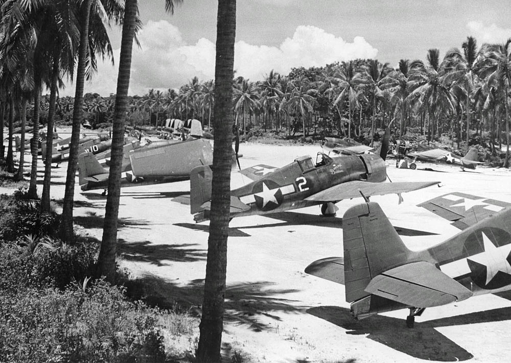 Grumman F6F-3 Hellcat fighters of the U.S. Navy Fighting Squadron 40 (VF-40) on the runway at Espiritu Santo. (U.S. Navy Photograph.)